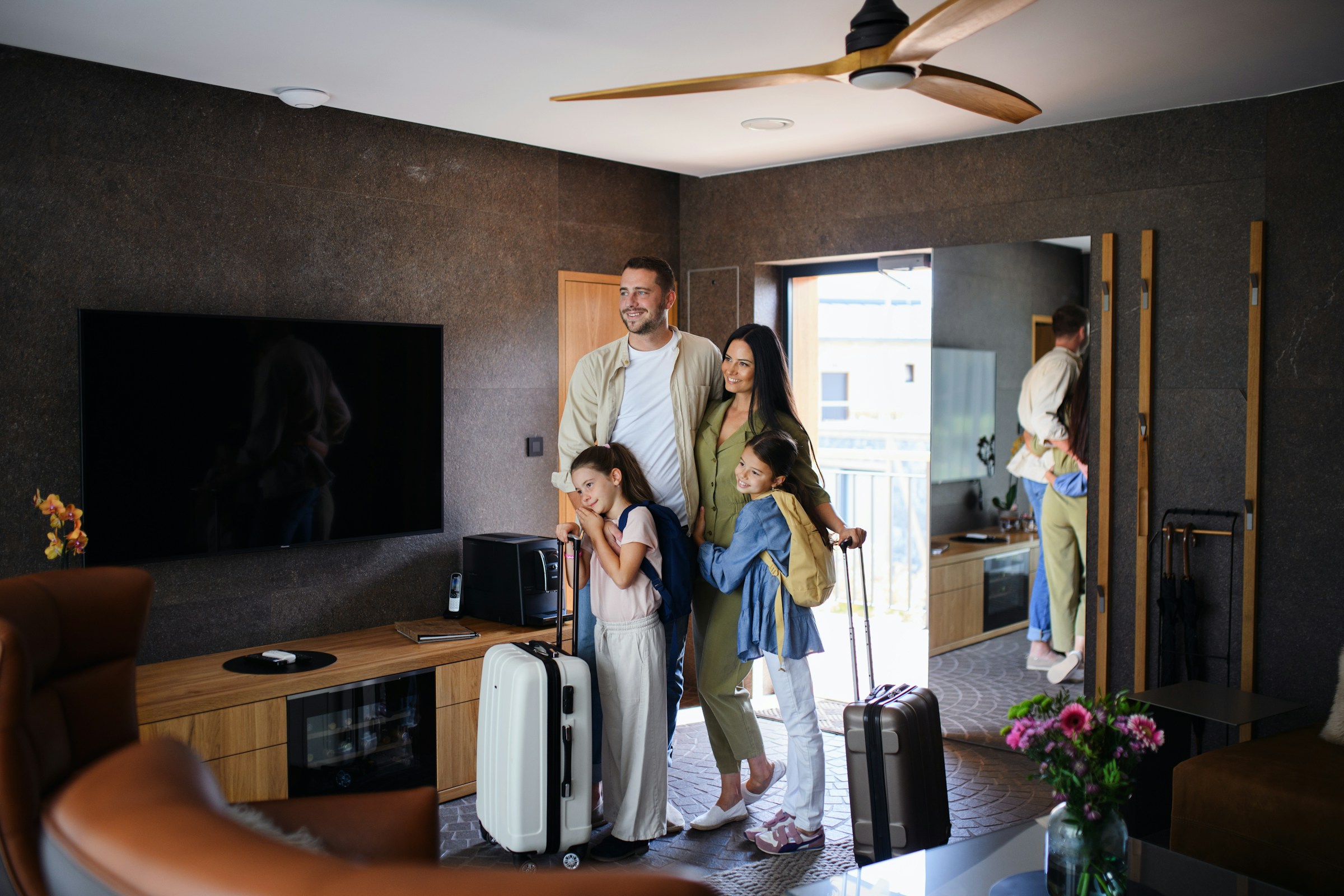 Happy family in a luxury boutique hotel